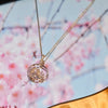 2 love birds on branch pendant in rhodium plating with crystals from forest jewelry