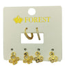 Gold huggies earrings with interchangeable on a 'FOREST' branded card