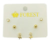 Set of gold earrings on a 'FOREST' branded card