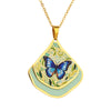 Gold necklace with a blue butterfly pendant on a white background
