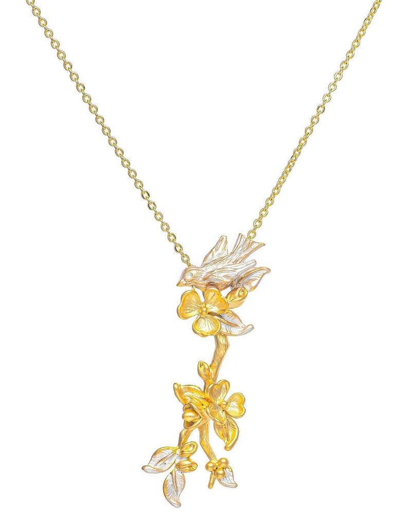 necklace pendant in yellow gold plating with canary bird and flower petals long from forest jewelry singapore