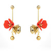 a pair of dangling gold plated flora flower earrings in cherry red form forest jewelry singapore