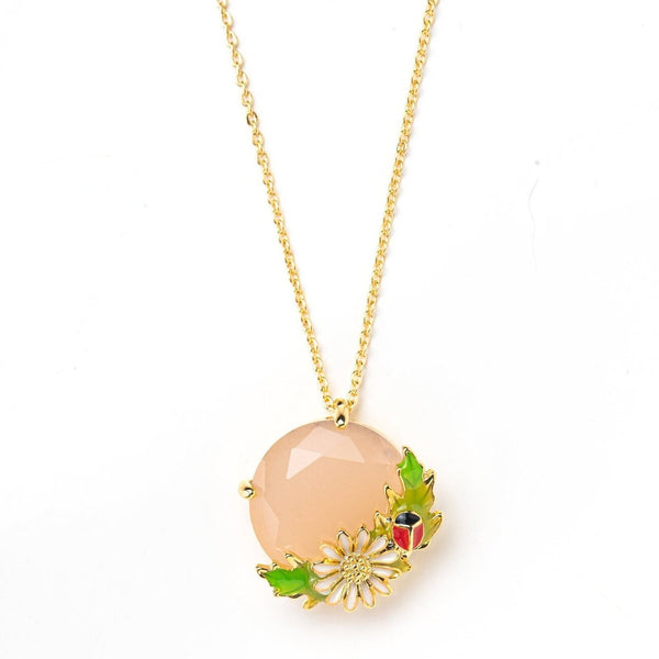 necklace pendant with ladybird ladybug and leaves and flower in gold plating from forest jewelry singapore