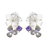 a pair of jasmine earrings with petals made from mother of pearls in rhodium plating from forest jewelry singapore