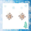 a pair of snowflake crystals earrings made with swarovski elements in rose gold plating christmas from forest jewelry singapore