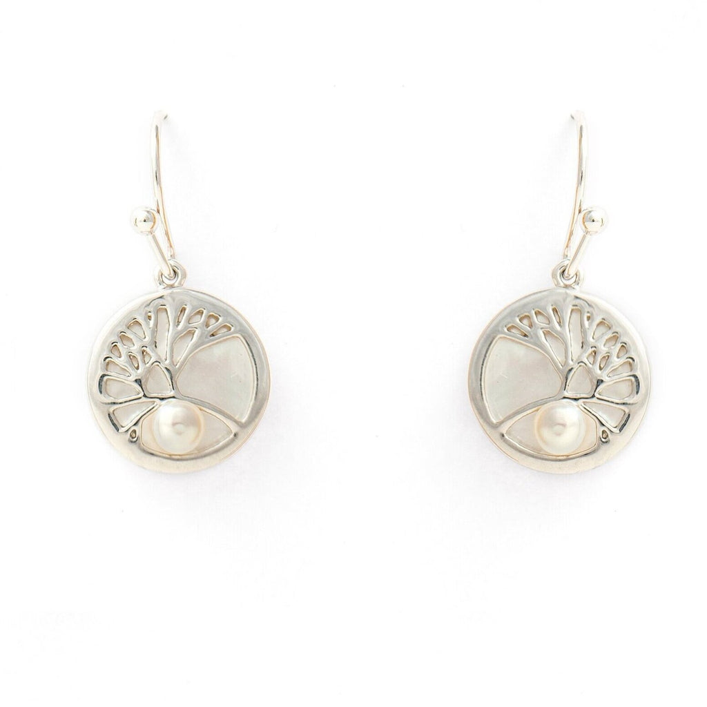 a pair of stud earrings with tree and mother of pearl in rhodium plating from forest jewelry singapore
