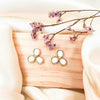 a pair of trillium spring flowers stud earrings made with leather in daisy white set in yellow gold plating from forest jewelry singapore