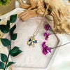 necklace pendant in yellow gold plating with gold and blue petals from forest jewelry