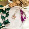 necklace pendant in yellow gold plating with gold and pink petals from forest jewelry