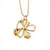 necklace pendant in yellow gold plating with gold and white petals from forest jewelry white background
